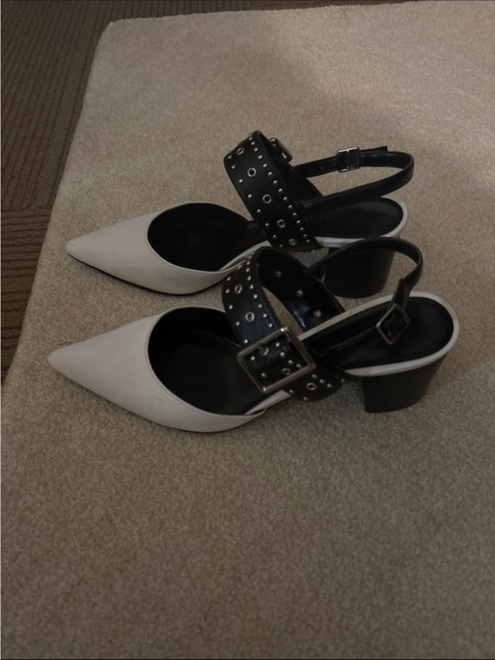 Charles & Keith White Pointed Slingback Heels with Black Studded Straps